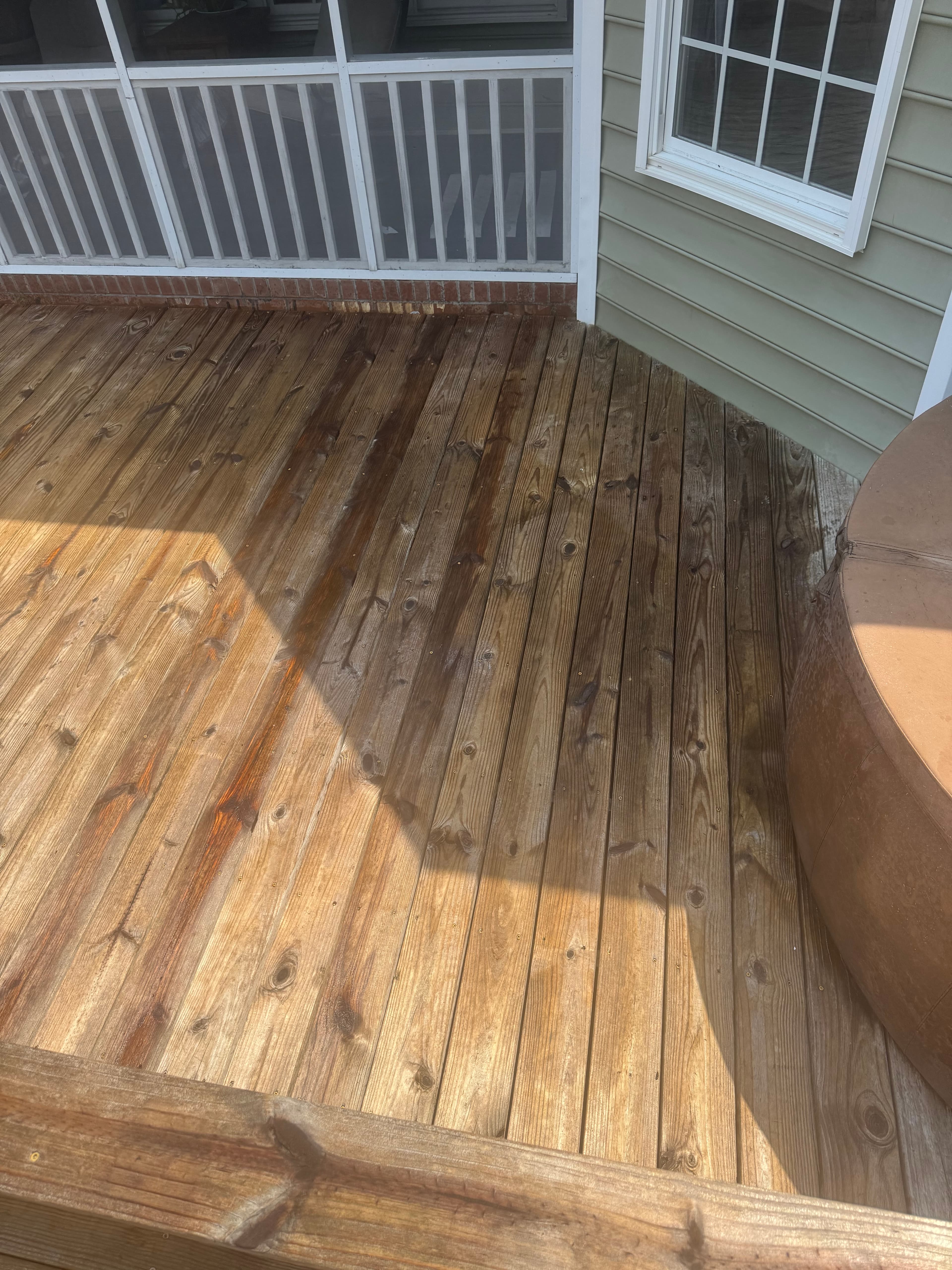 Wood deck cleaned and stained by Max Pressure in Fayetteville NC