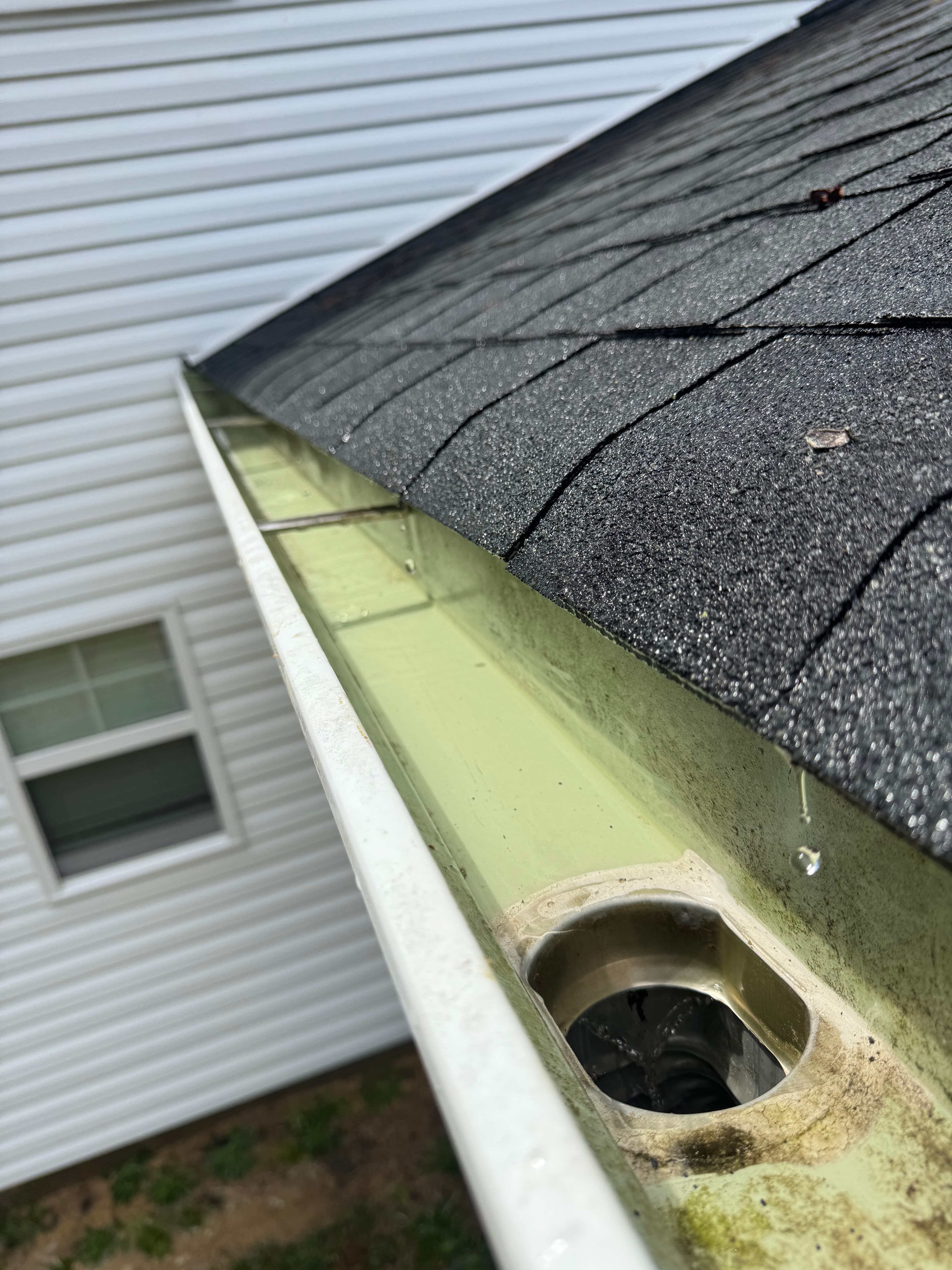 Gutters after cleanout by Max Pressure in Fayetteville NC — debris removed