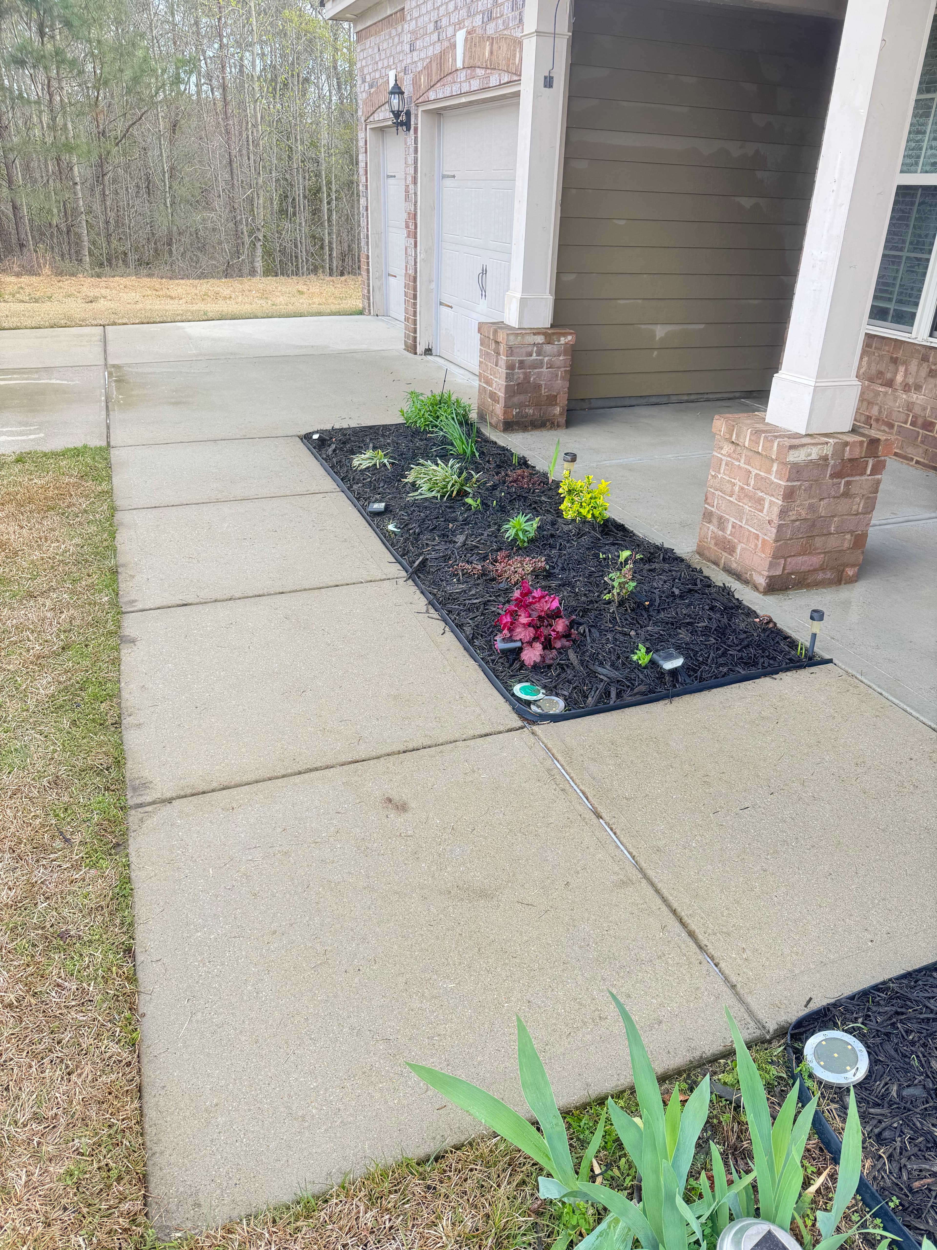 Clean concrete sidewalk after pressure washing by Max Pressure in Fayetteville NC