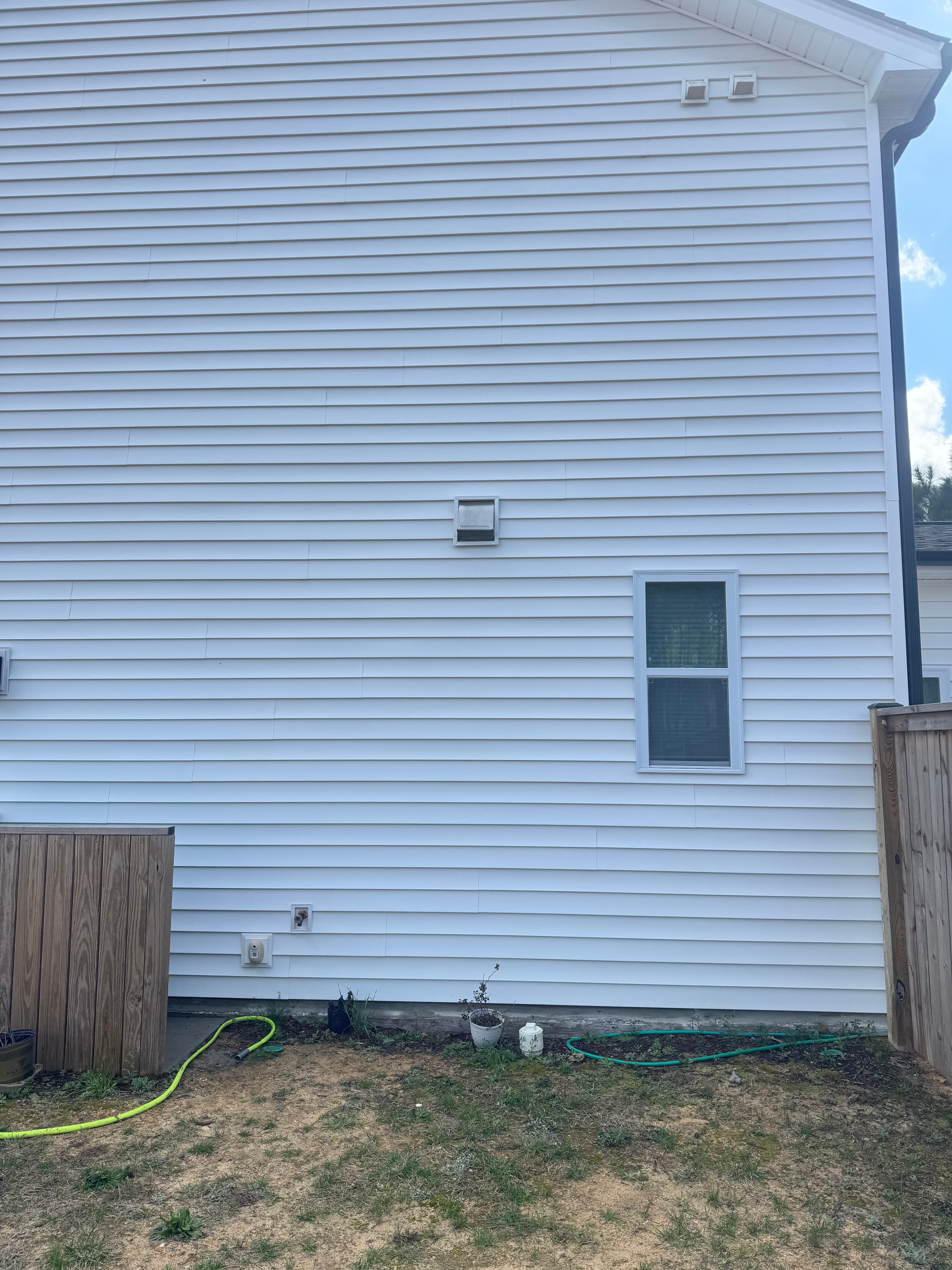 Clean vinyl surface after soft washing by Max Pressure in Fayetteville NC