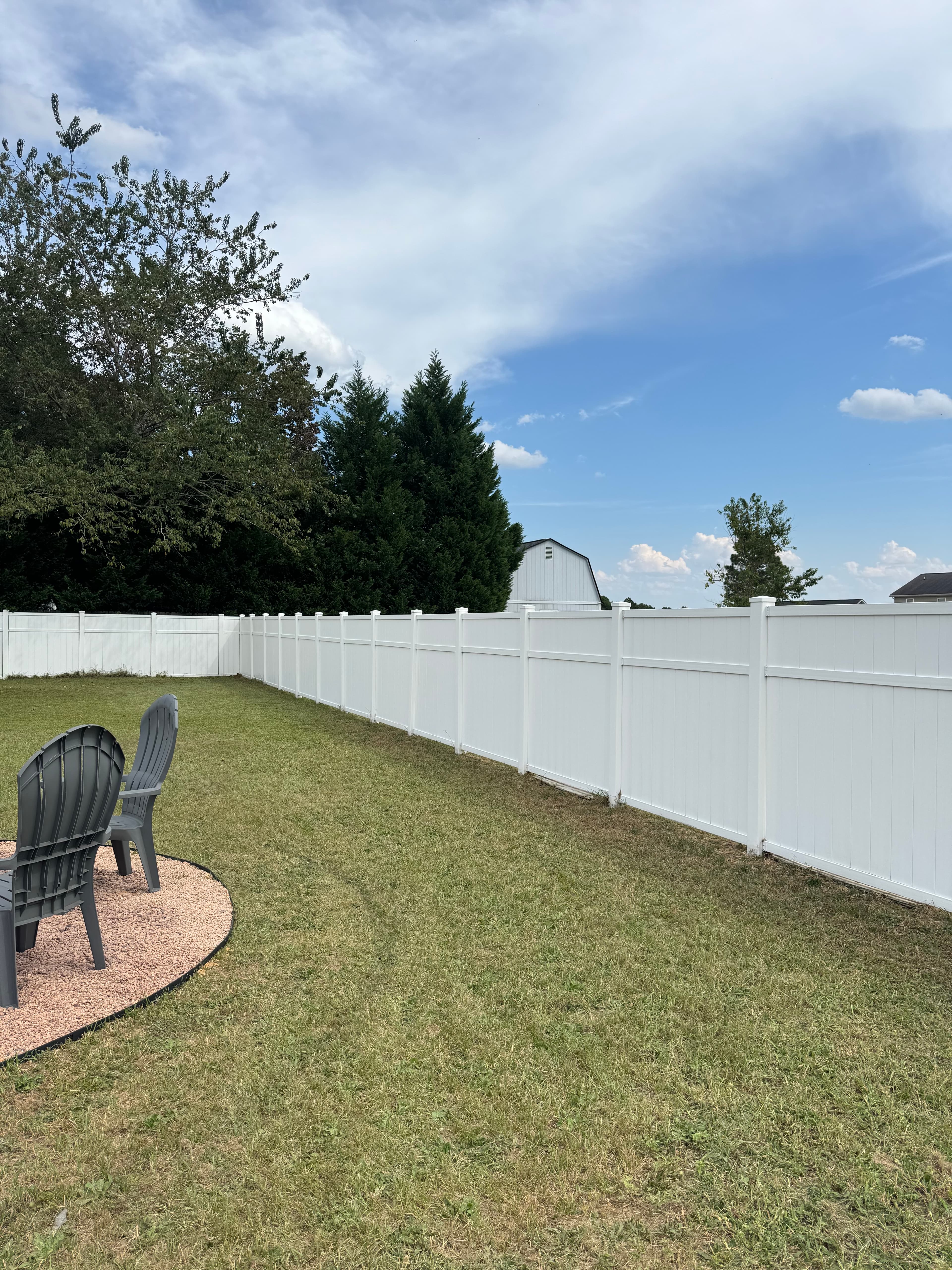 Clean vinyl fence after soft washing by Max Pressure in Fayetteville NC