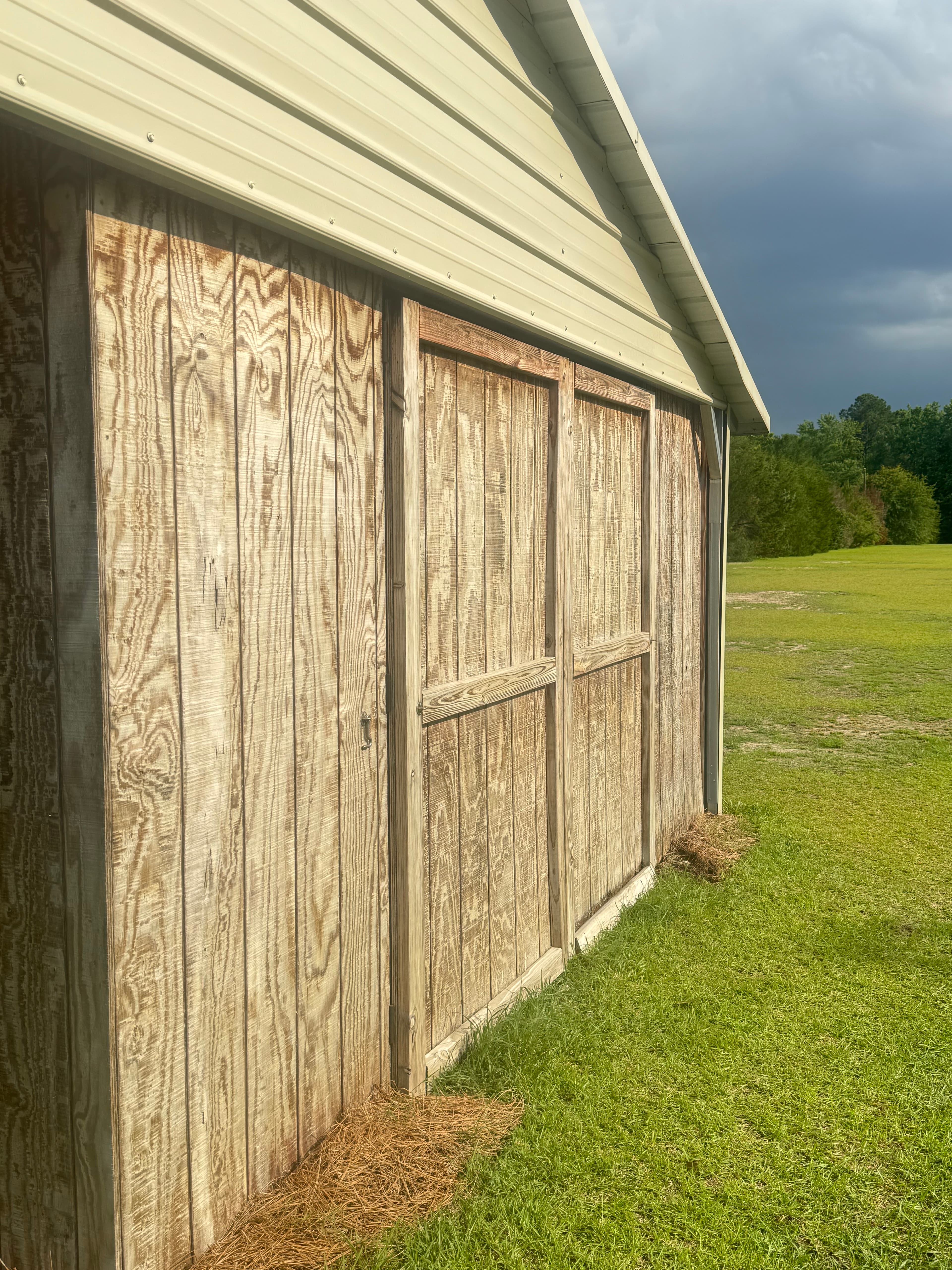 Clean wood shed exterior after soft washing by Max Pressure in Fayetteville NC
